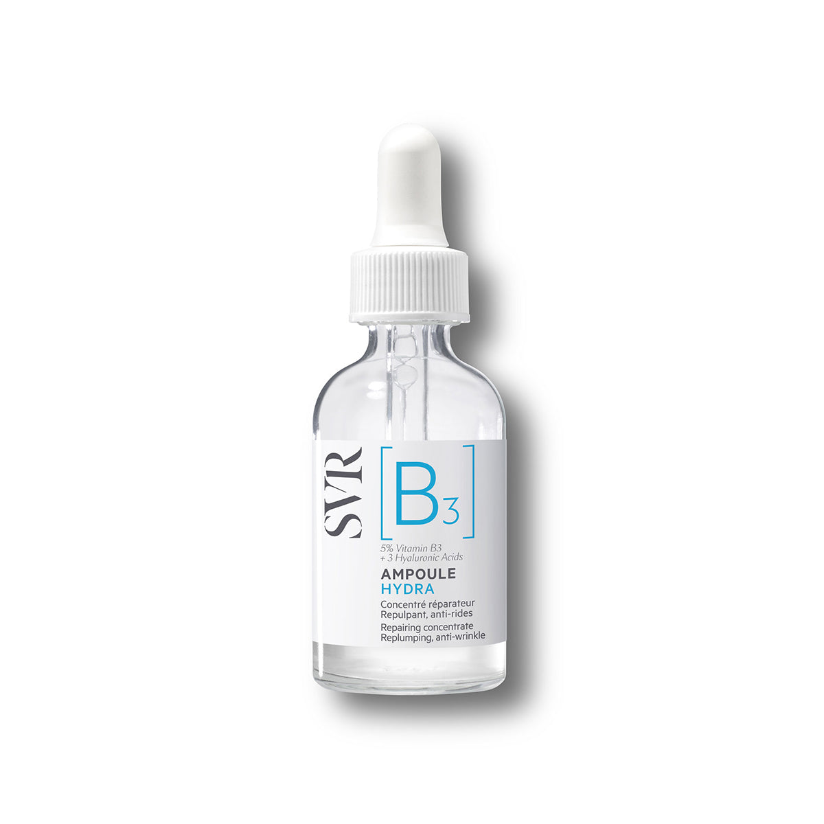 Frasco de vidrio transparente con gotero blanco de SVR Ampoule Hydra, serum facial con vitamina B3 y ácido hialurónico.